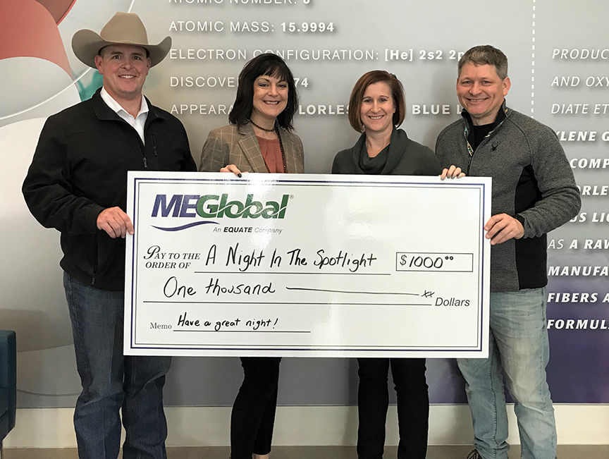 MEGLOBAL presents check to A Night in the Spotlight